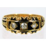 A 19thC. yellow metal enamelled mourning ring set