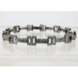 A 9ct white gold bracelet set with approx. 3ct dia