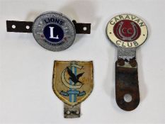 Three vintage motoring badges