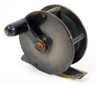 A bronze fishing reel