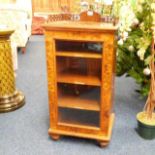 A burr walnut veneer glazed music cabinet 36in hig