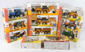 Ten boxed JCB, Caterpillar & similar diecast tract