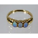 A 9ct gold ring set with three opals 1.6g size J