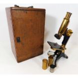 A 19thC. brass microscope by Baker of London with