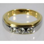 An 18ct two colour gold ring set with approx. 0.45