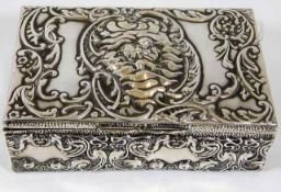 An antique silver ring box with embossed decor & b