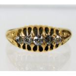 A Victorian 18ct gold ring set with five diamonds