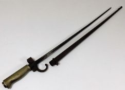 A 19thC. French quatrefoil bayonet with scabbard