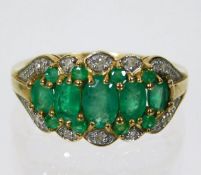 A yellow metal diamond & emerald ring 3.1g size N/