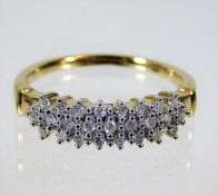 A 9ct gold ring set with diamonds of 0.25ct 2.5g s