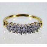 A 9ct gold ring set with diamonds of 0.25ct 2.5g s