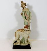 An art deco style Capodimonte woman with borzoi