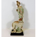 An art deco style Capodimonte woman with borzoi