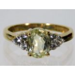 A 9ct gold ring set with paste stones 3.3g size N