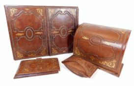 A leather writing set containing blotter & station