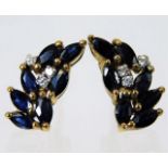 A pair of 9ct gold sapphire 7 diamond earrings