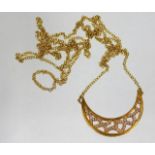 An 18ct gold necklace & pendant set with diamonds