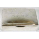 A silver tobacco box with inscription to "Lt. L. C