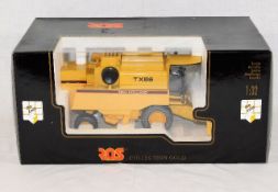 A diecast boxed Ros New Holland TX66
