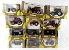 Twelve Universal Hobbies boxed diecast tractor & a
