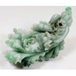 An elaborately carved Chinese jade flower 6.5in lo