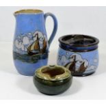 A Doulton stoneware jug & tobacco jar with sailshi