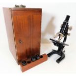 A Cooke, Troughton & Simms microscope with additio