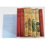 Seven Enid Blyton books & a hand written Enid Blyt