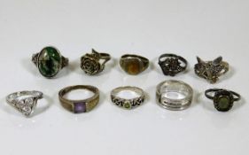 A quantity of ten silver & white metal rings
