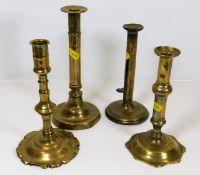 Four 18thC. brass candlesticks, some faults