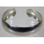 A silver bangle with machined decor 24.6g