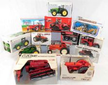 Fourteen boxed Ertl diecast tractor & other agricu