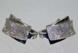 A pair of 18ct white gold stylised earrings 5.3g