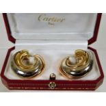 A boxed pair of tri-colour 18ct gold Cartier earri