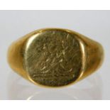 A 9ct gold signet ring with faint carved crest 6.6