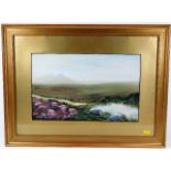 A gilt framed painting of Saddle Tor on Dartmoor s