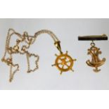 Of marine interest, a 9ct gold chain & yacht wheel