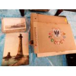 A collection of various postcards & photographs