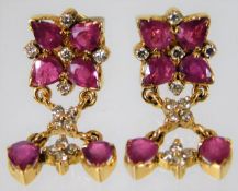 A pair of 18ct gold ruby & diamond earrings 8.2g