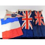 Four naval flags & ensigns, largest 35in x 16.5in
