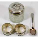 A silver topped tidy, a pair of small silver napki