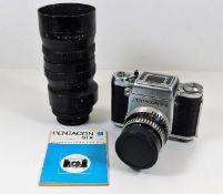 A Pentacon Six camera with zoom lens & instruction