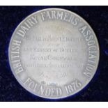 A silver British Dairy Farmers medallion awarded t