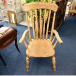 A large 19thC. slat back beech & elm armchair