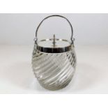 A c.1900 silver plated top glass biscuit barrel
