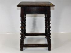 A Victorian oak stool