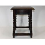 A Victorian oak stool