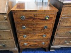 A small flame mahogany chest of drawers 31in high