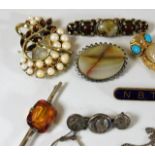 A quantity of mixed costume jewellery silver mount