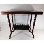 A 20thC. mahogany table with gallery under